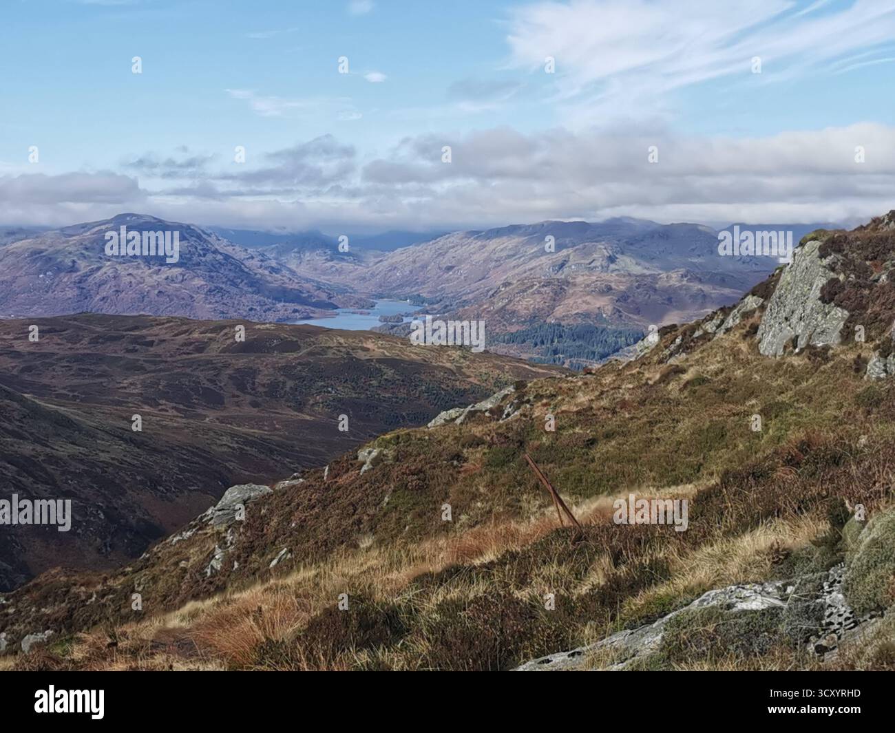 View from Ben Venue over Loch Katrine, Garradh, Maol Mor, Cruinn Bheinn and Glen Finglas in the Trossachs, Scotland in autumn. Highland landscape. - Smartphone Captured Stock Image