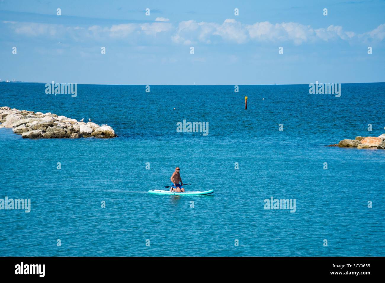 Man woman kneeling in water hi-res stock photography and images - Alamy
