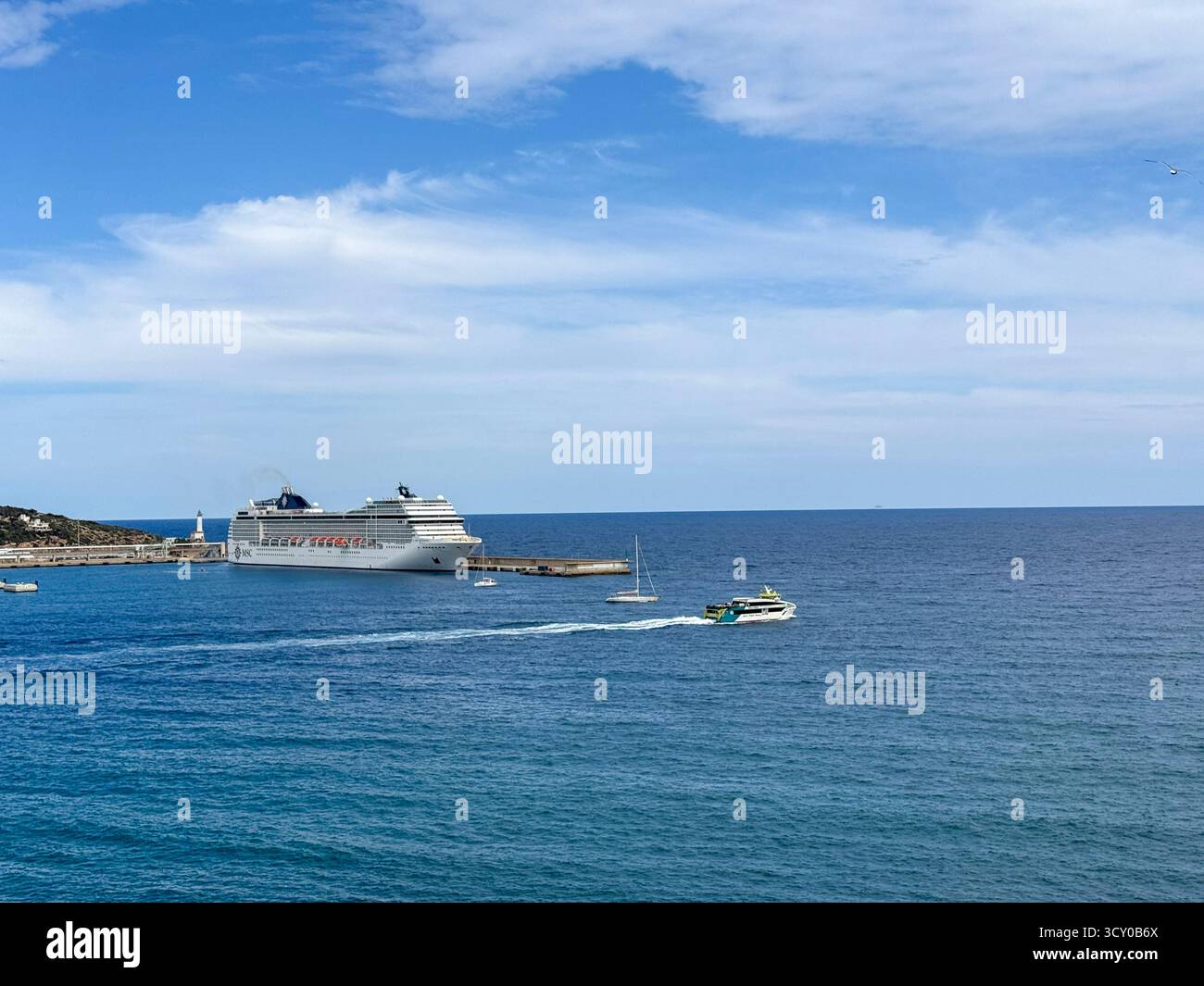 Panoramic view over Eivissa Harbour and Marina from Plaça d’Espanya in Dalt Vila, Ibiza Town, Balearic Islands, Spain: Phillip Roberts - Smartphone Captured Stock Image