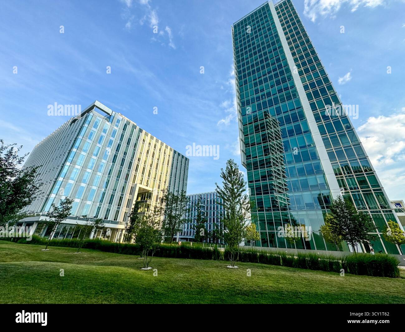 Modern office buildings with curved glass facades in the tech ...
