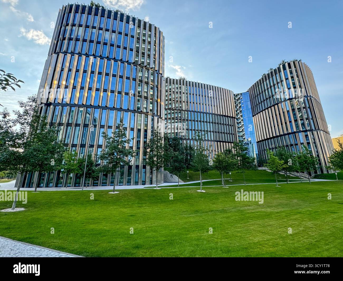 Modern office buildings with curved glass facades in the tech ...