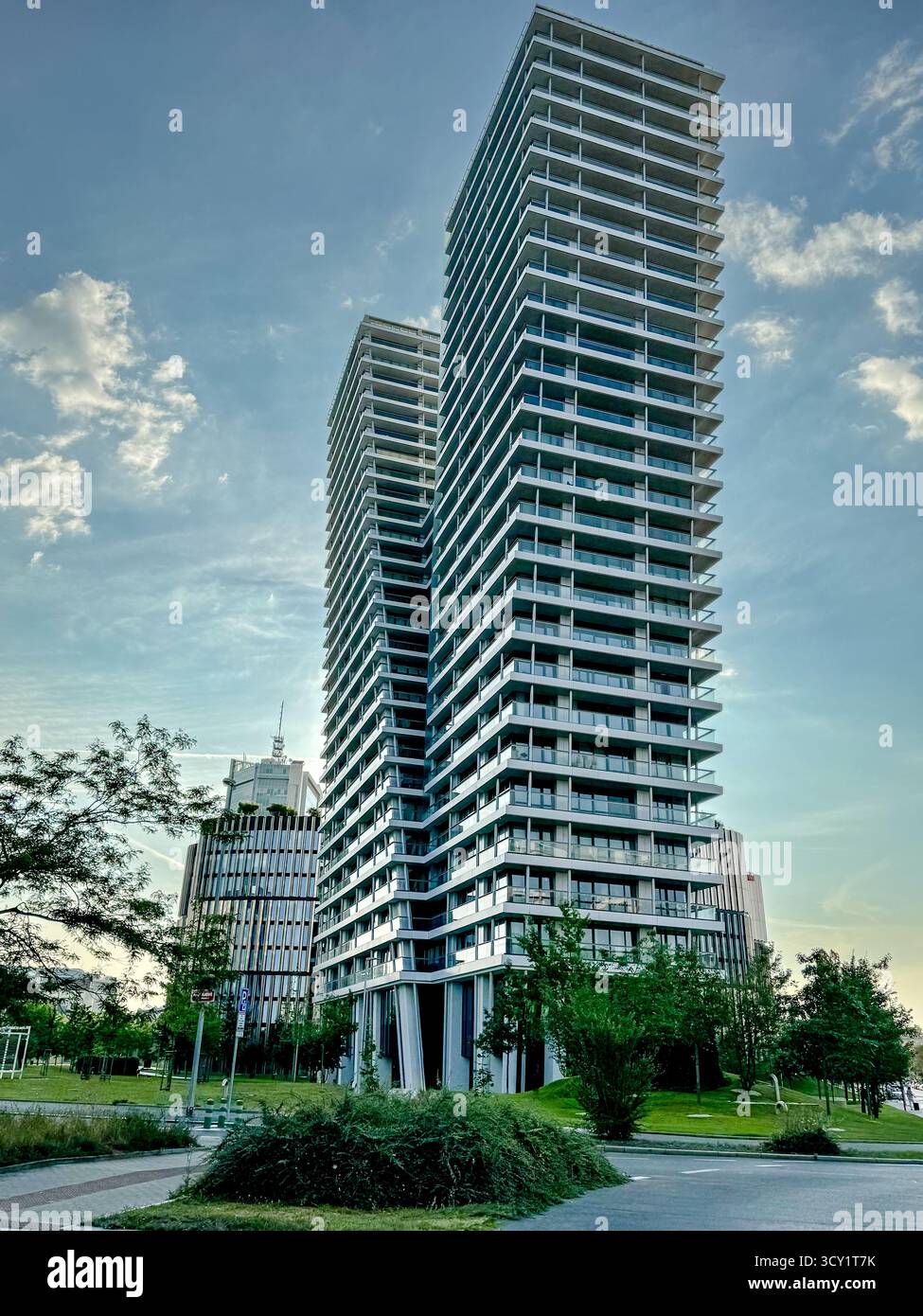 Modern office buildings with curved glass facades in the tech ...