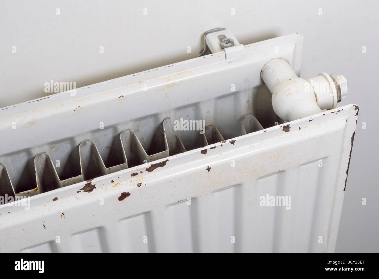 Corroding Radiator Corrosion on the metal surface of a heating radiator in a room Stock ...