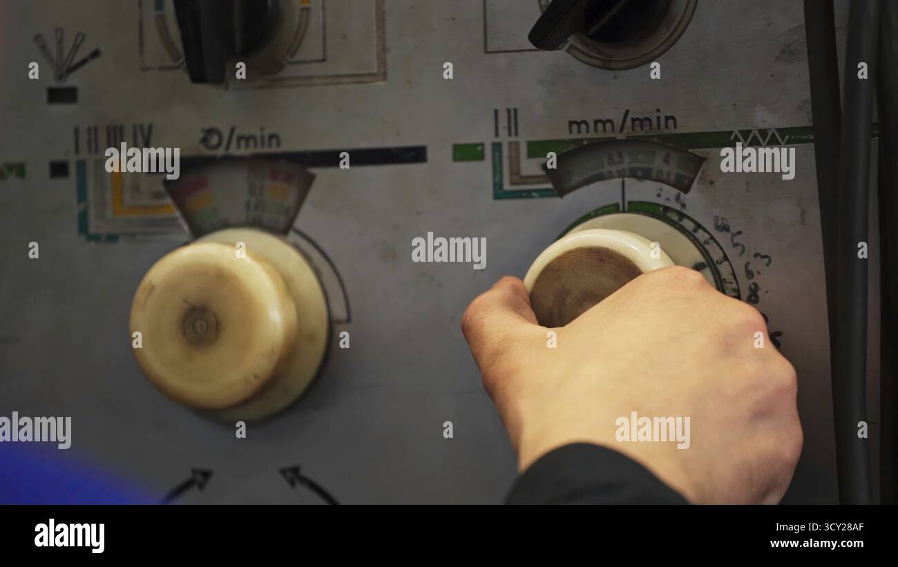 Industrial worker adjusting knobs on hi-res stock photography and ...