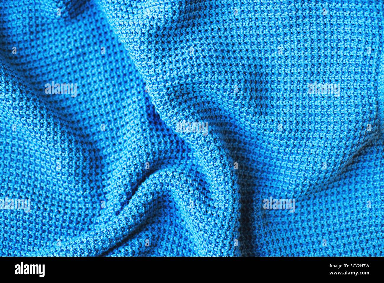 Blue knitted textile showing hi-res stock photography and images - Alamy