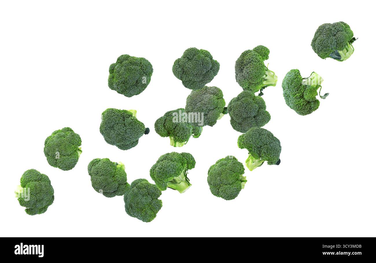 Fresh green broccoli flying in air on white background Stock Photo - Alamy