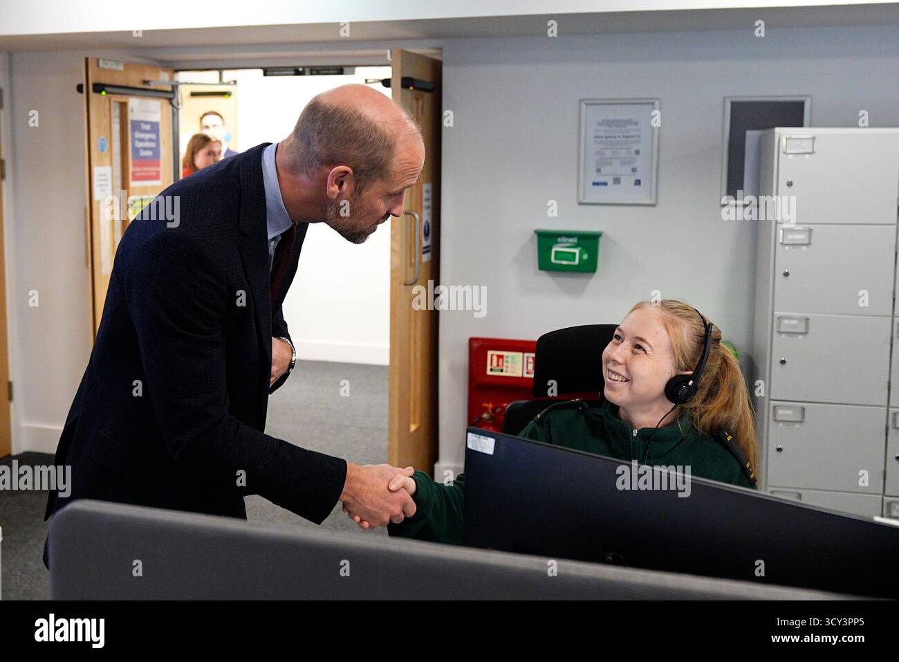 The Prince of Wales meets a call handler in the Emergency Operations ...