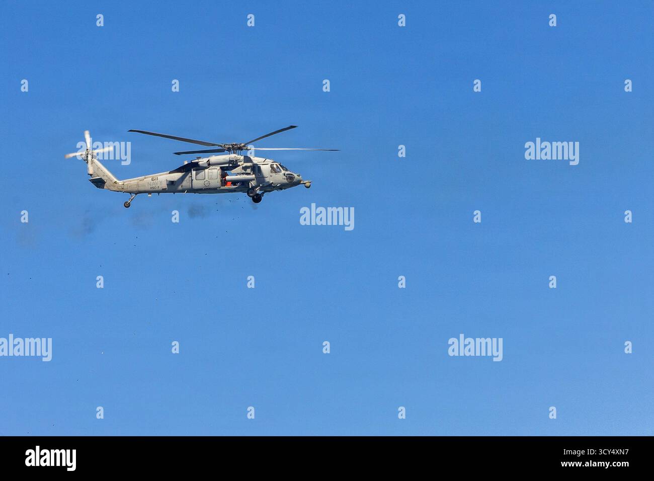 251004-N-VW875-1934 ATLANTIC OCEAN (Oct. 4, 2025) An MH-60S Sea Hawk ...