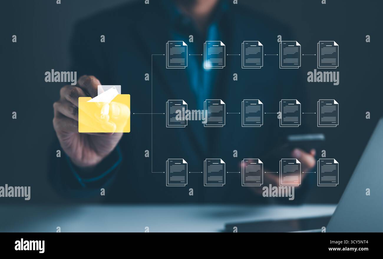 DMS Concept. Businessman interacting with a digital document management system interface, showcasing organization and technology integration. folder t Stock Photo