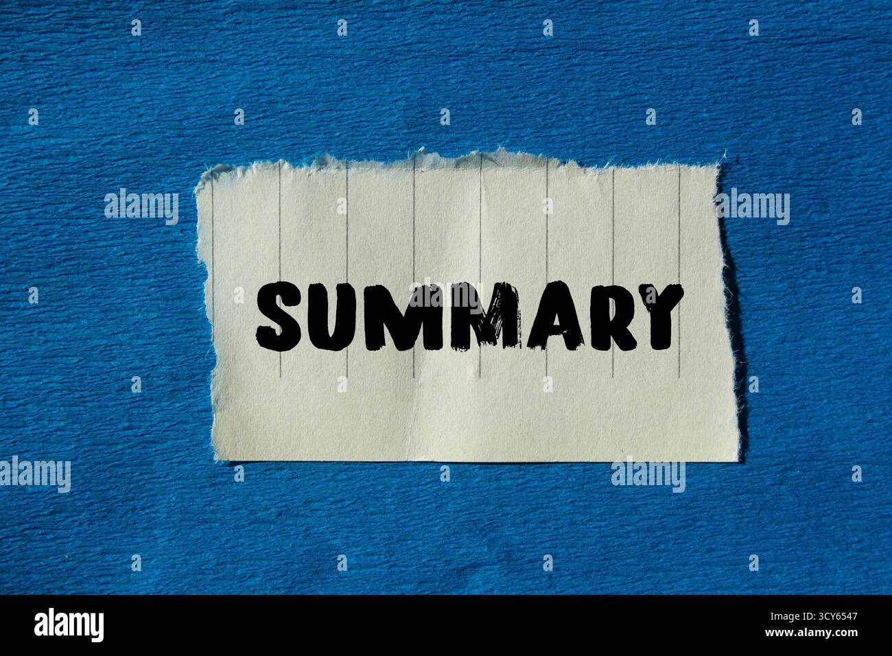 Summary message written on ripped torn paper background. Conceptual ...