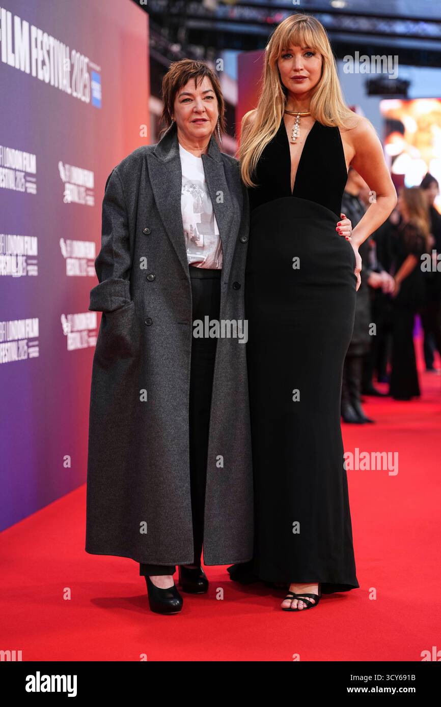 Jennifer Lawrence, right, and director Lynne Ramsay pose for ...