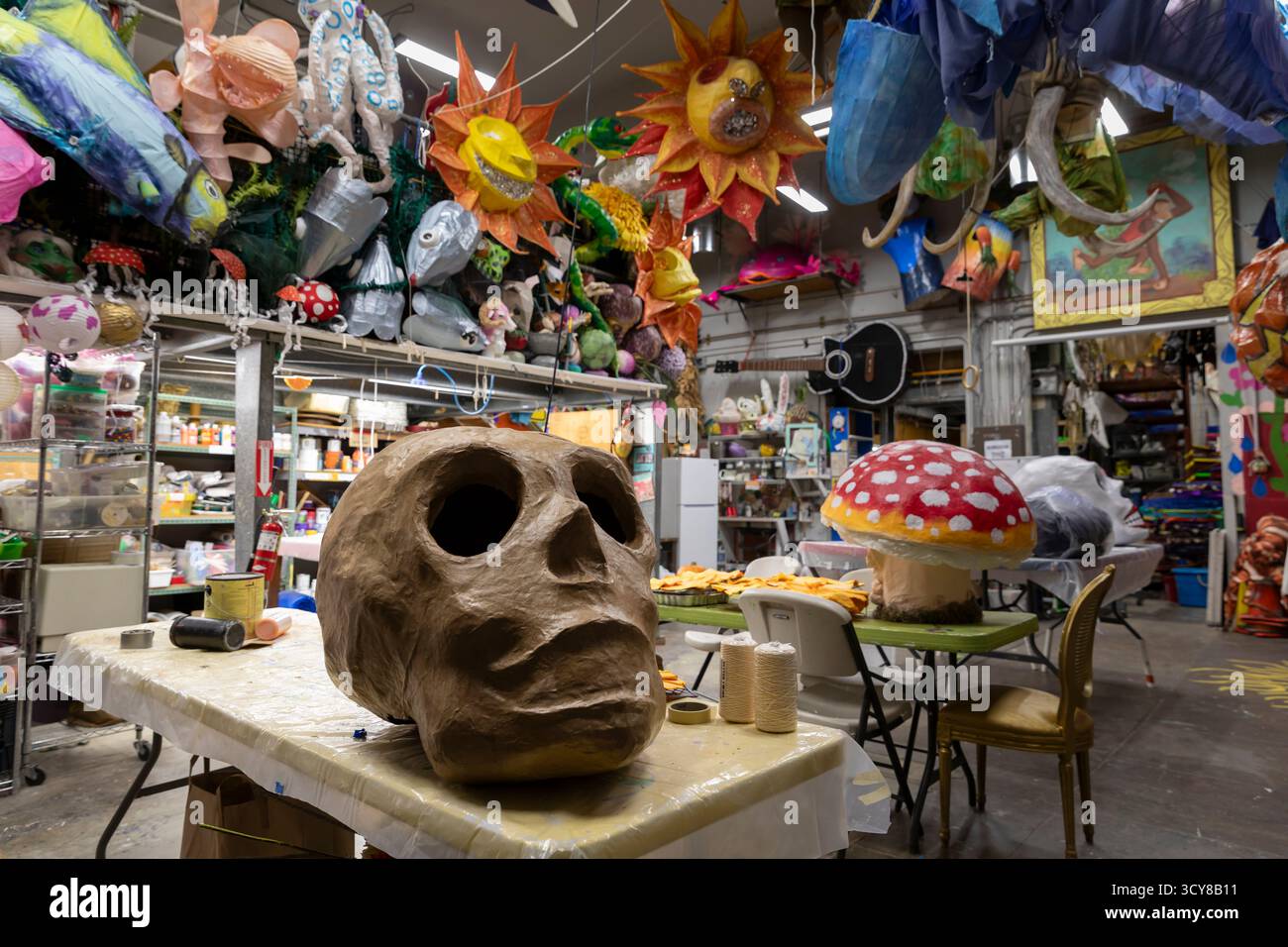 Papier-mâché skulls are prepared at a workshop for the upcoming Día de los Muertos celebration at the Powerhouse Art Studio in Seattle on Thursday, Oc Stock Photo