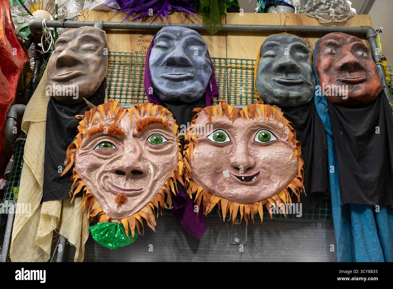A collection of papier-mâché masks on display at a workshop for the upcoming Día de los Muertos celebration at the Powerhouse Art Studio in Seattle on Stock Photo