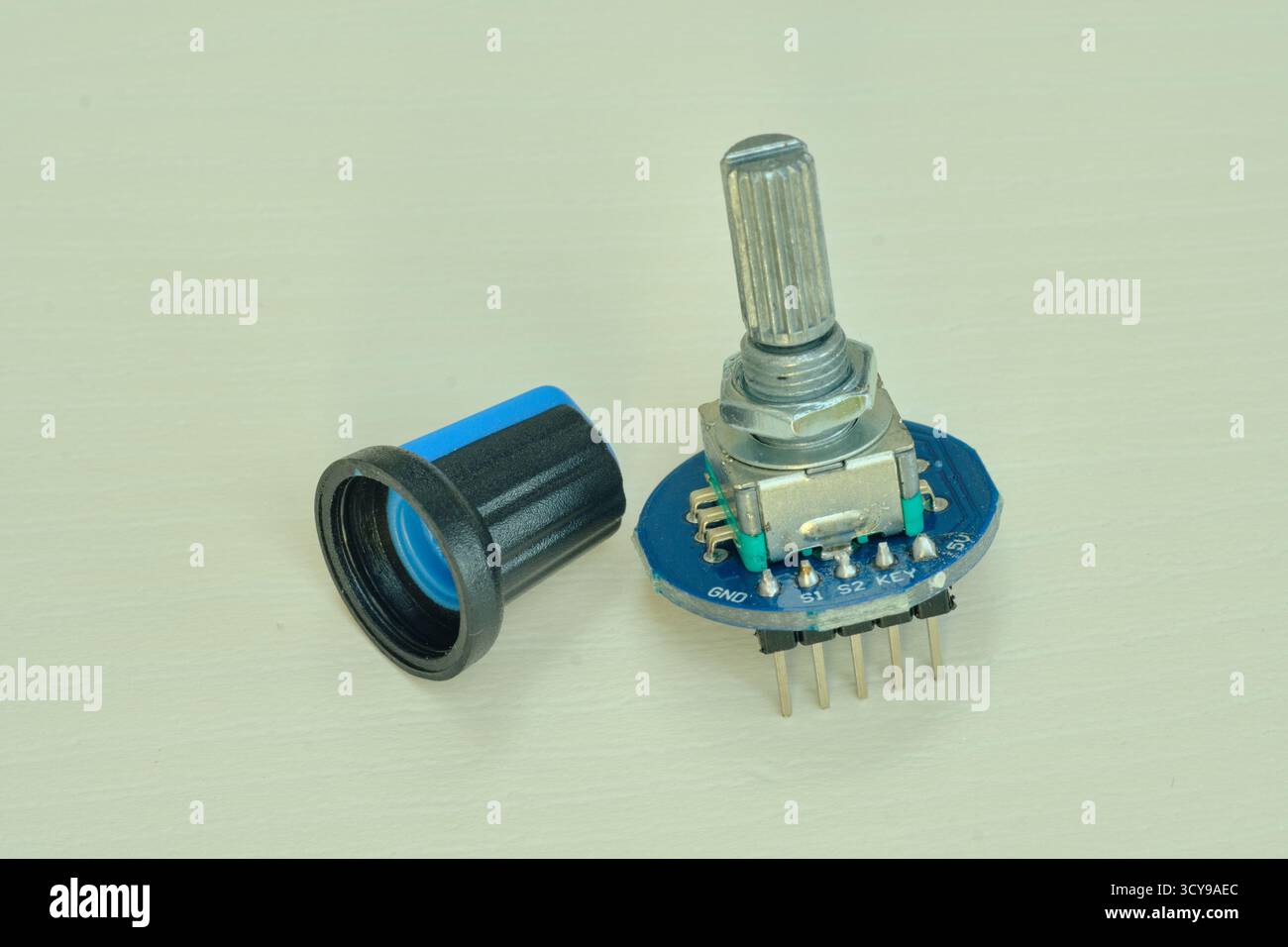 Variable resistor isolated on white background. Electronic parts concept. potentiometer. Stock Photo