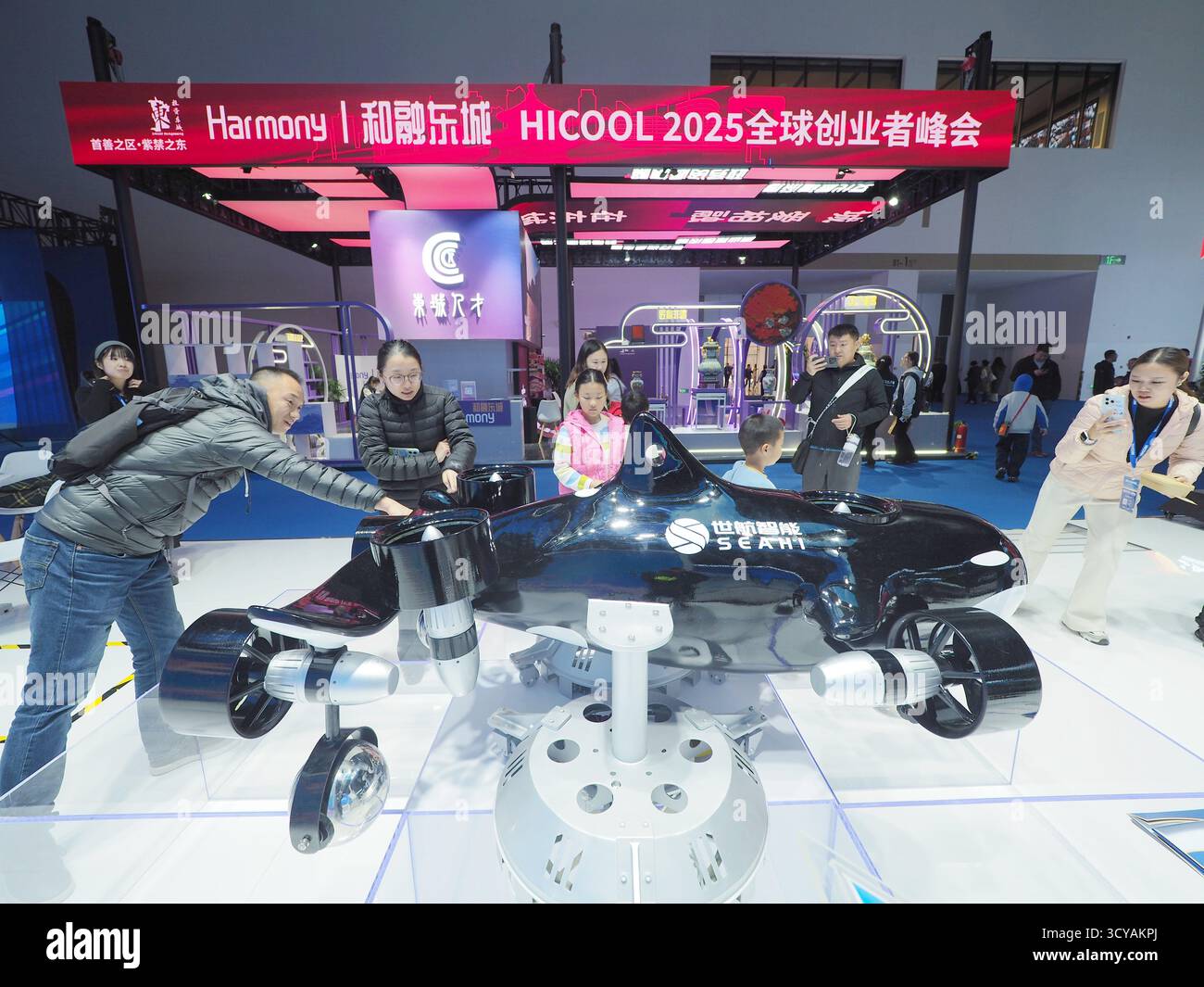 Visitors visit the Orca Robot at the HICOOL 2025 Global Entrepreneur ...