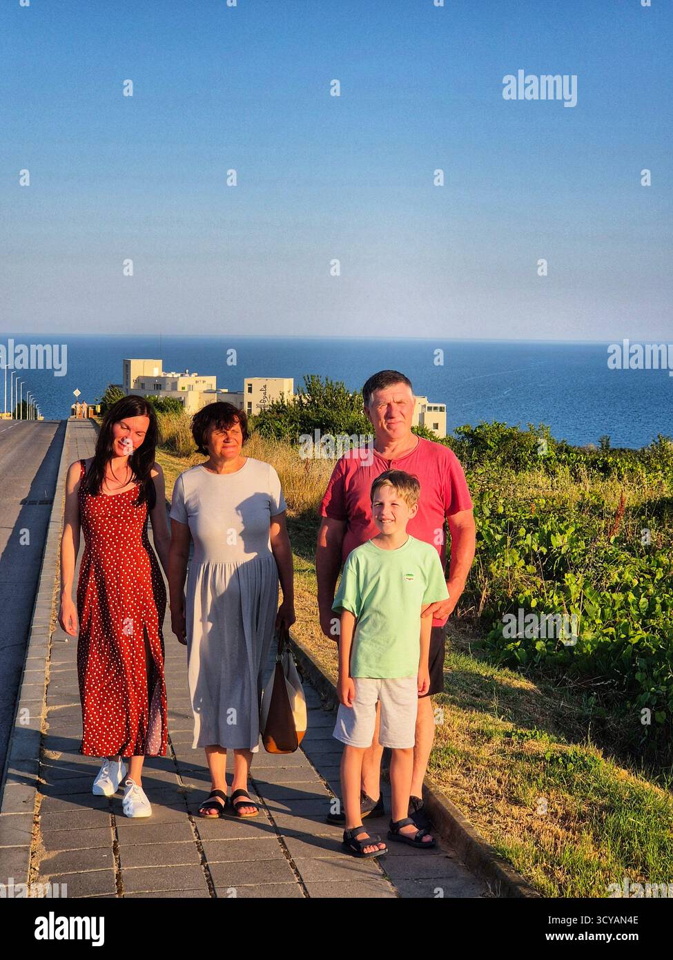 Family time walks sea hi-res stock photography and images - Alamy