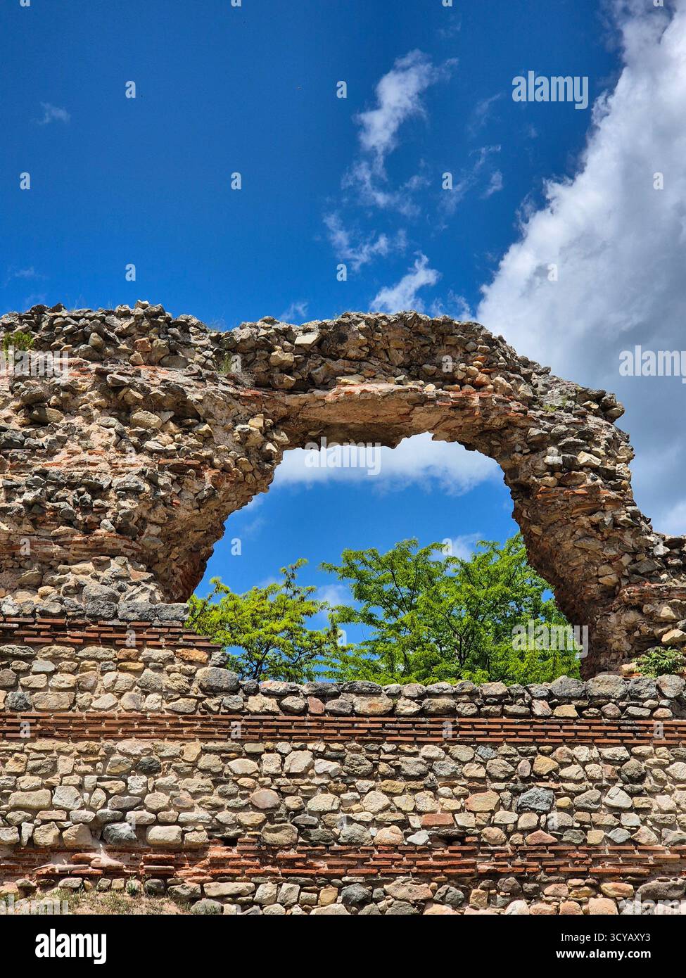 fragment of an ancient stone arch in the town of Hisarya, Bulgaria - Smartphone Captured Stock Image