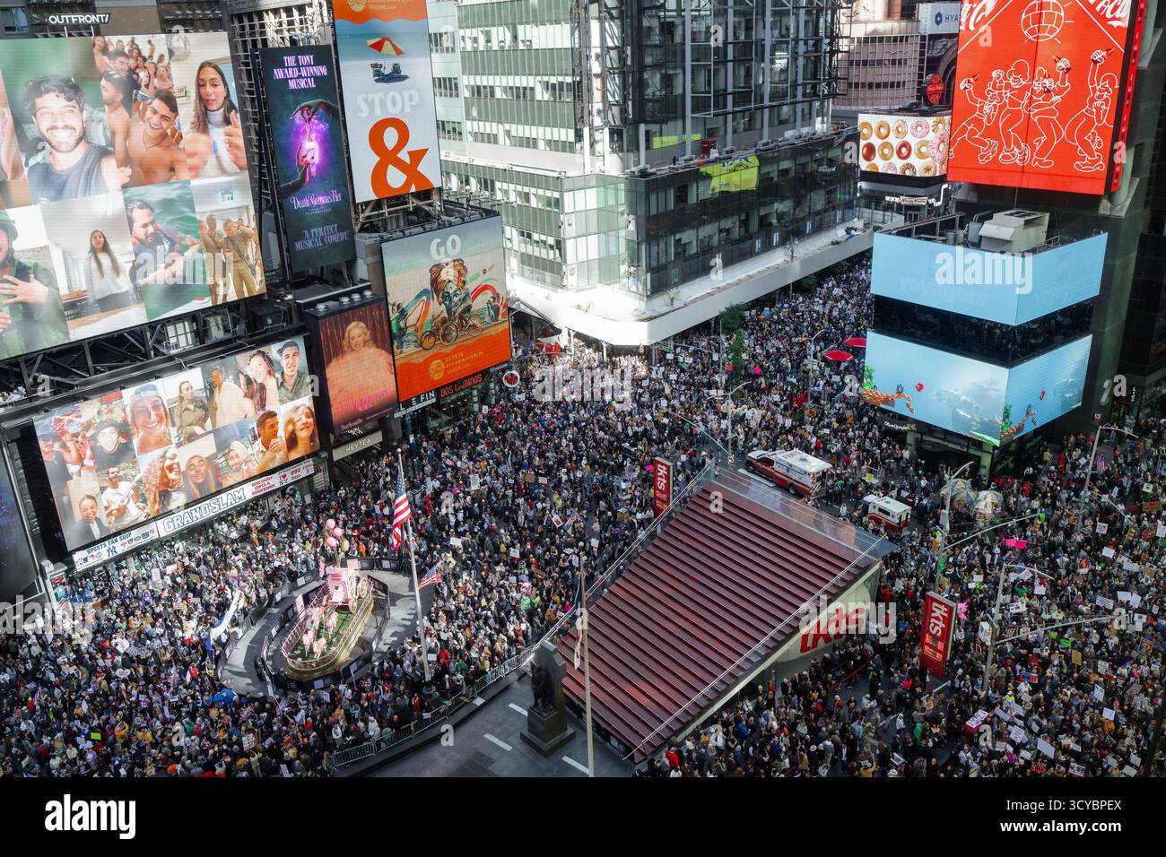 Thousands Of Thousands of protesters fill Times Square during a