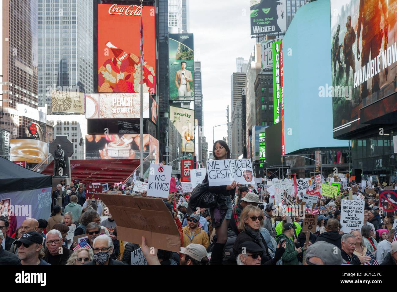 Thousands of protesters fill Times Square during a "No Kings" protest ...
