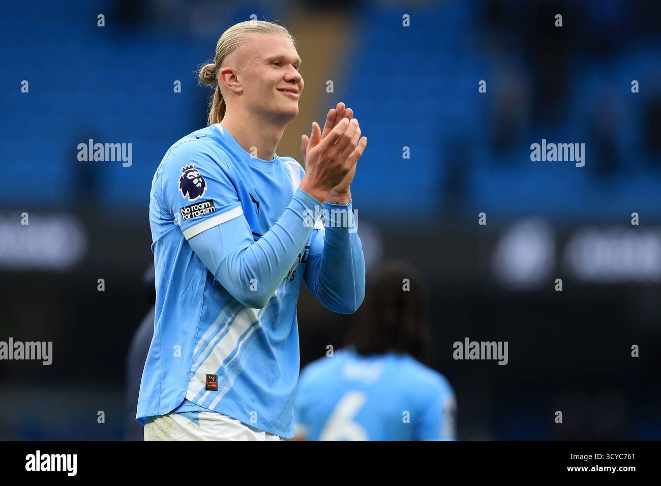 Erling Haaland of Manchester City applauds the traveling fans as