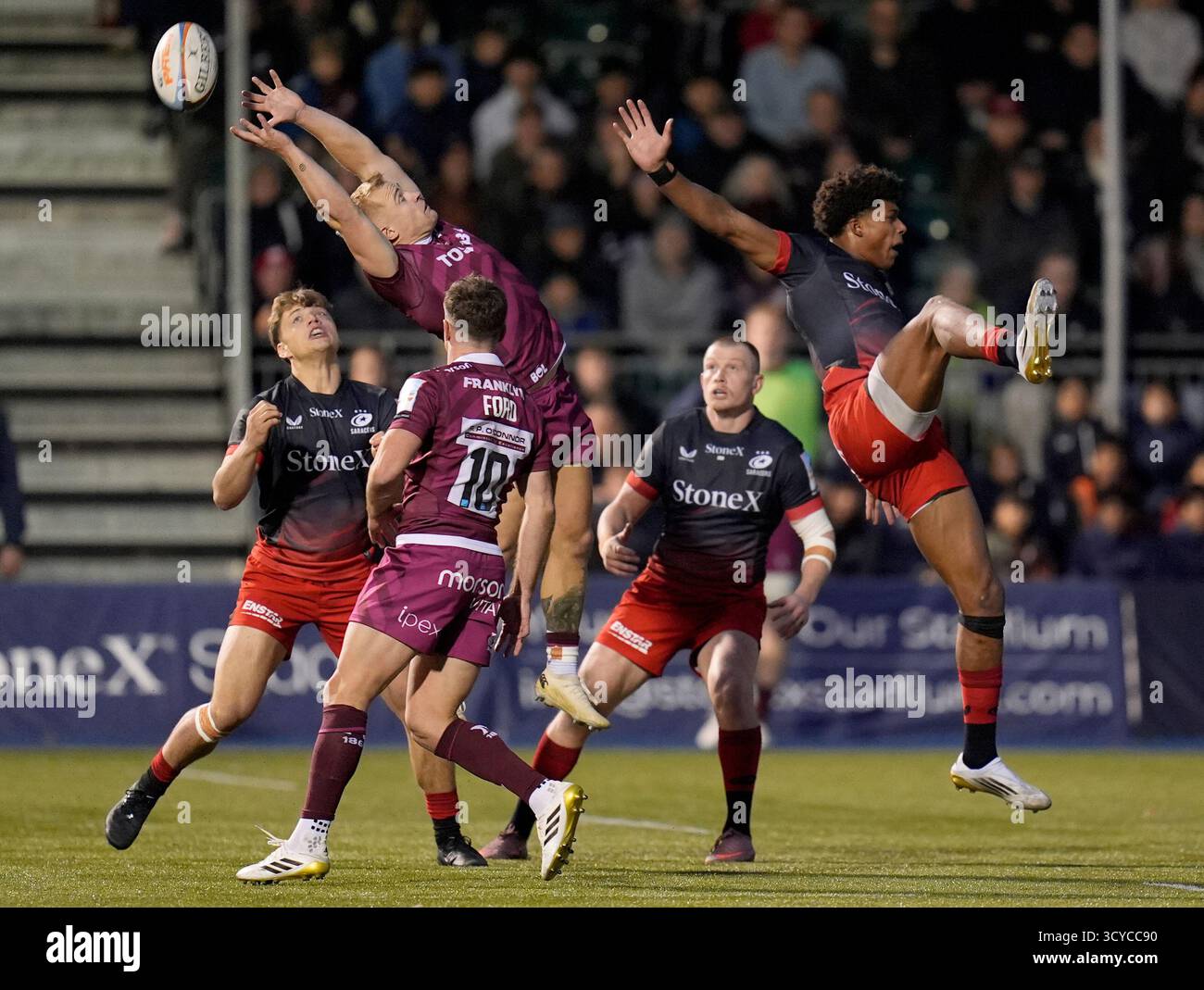 Sale Sharks' Arron Reed (top left) and Saracens' Noah Caluori (top ...
