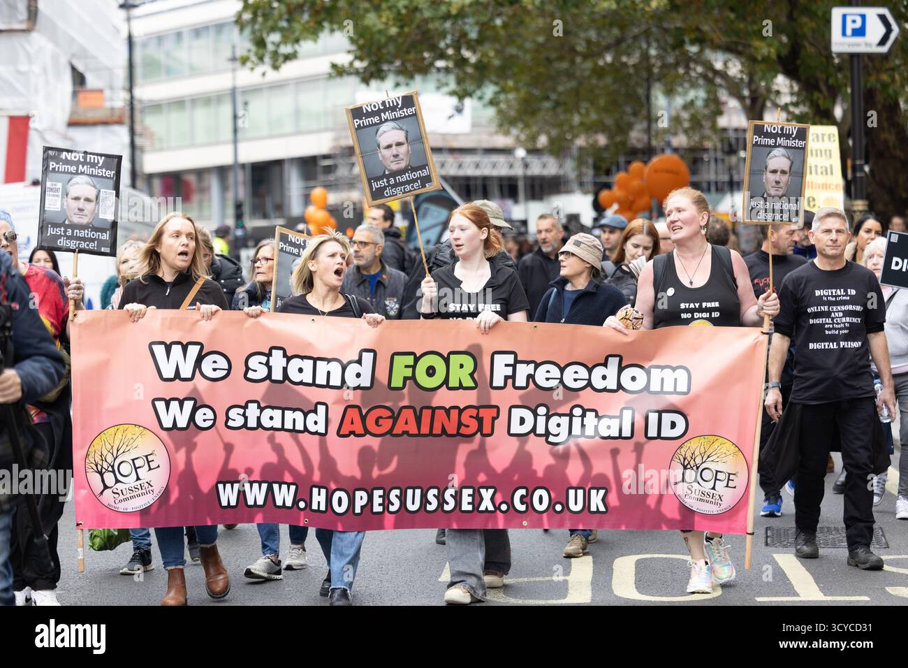 Protestors march through central London in opposition to the proposed ...
