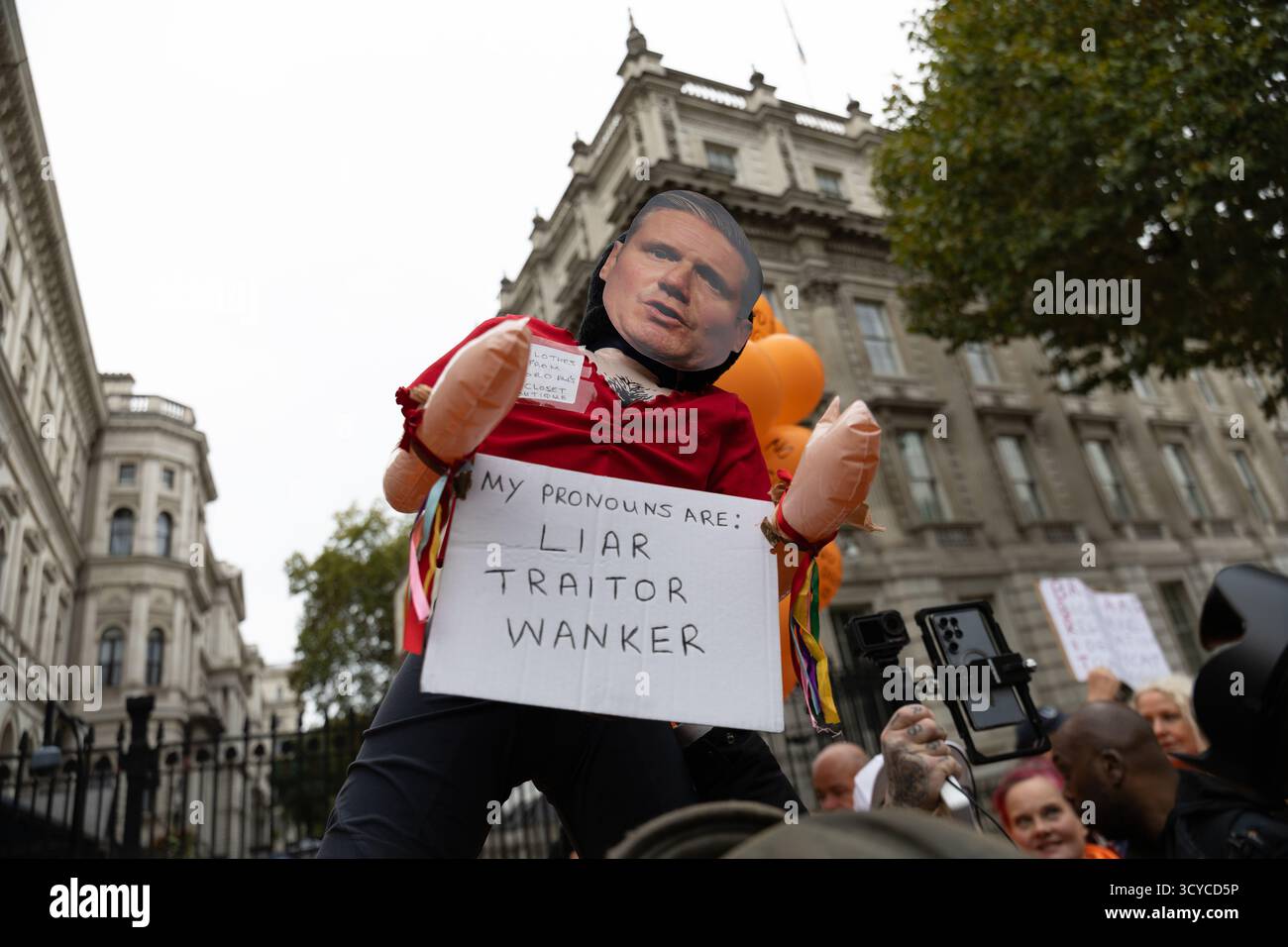 Protestors march through central London in opposition to the proposed ...