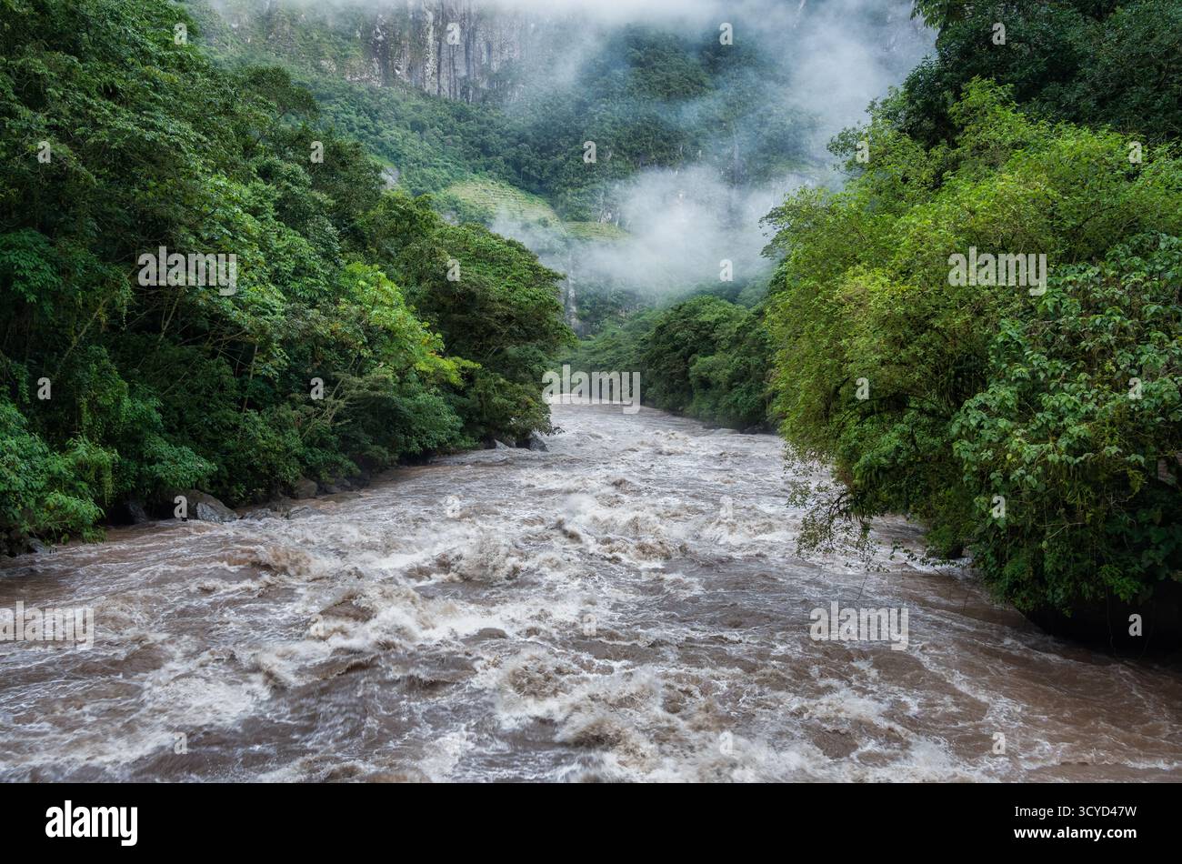 Scenic dramatic view with the powerful waters of Urubamba River crossing the Sacred Valley in Aguas Calientes Stock Photo