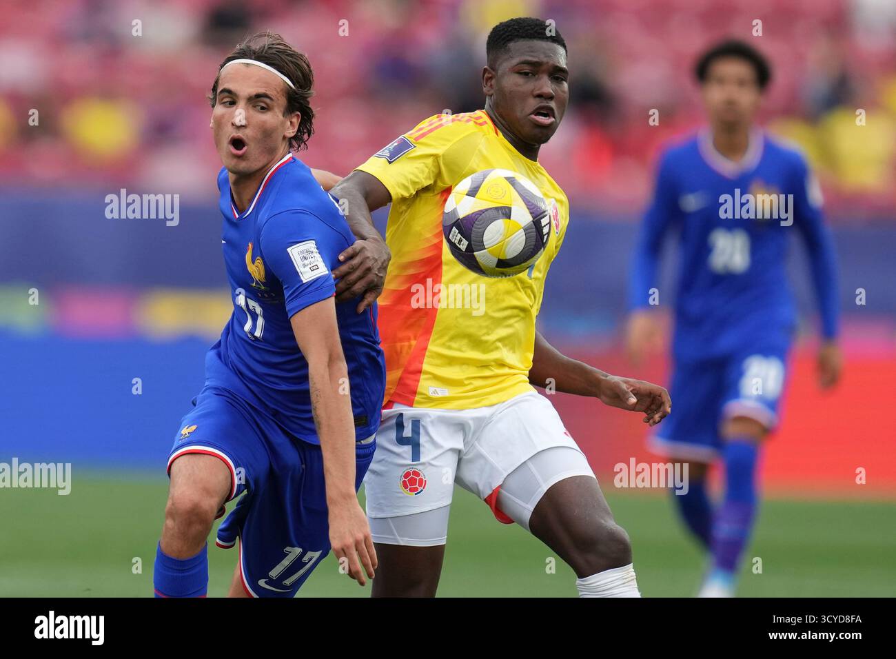 Colombia's Julian Bazan (4) and France's Andrea Le Borgne battle for