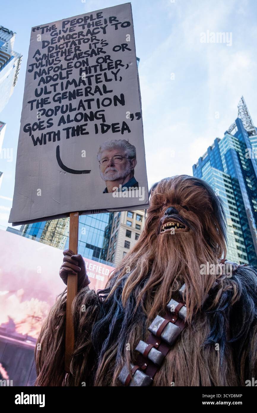 New York, NY, USA. 18th Oct, 2025. Thousands of No Kings protesters paraded from Fr. Duffy Square at 47th Street down Seventh Avenue to 14th Street to protest the Trump administration and its policies. A man in a Wookie costume from Star Wars holds a placard with a quote from George Lucas on dictatorships. Credit: Ed Lefkowicz/17�Թ����� Live News Stock Photo