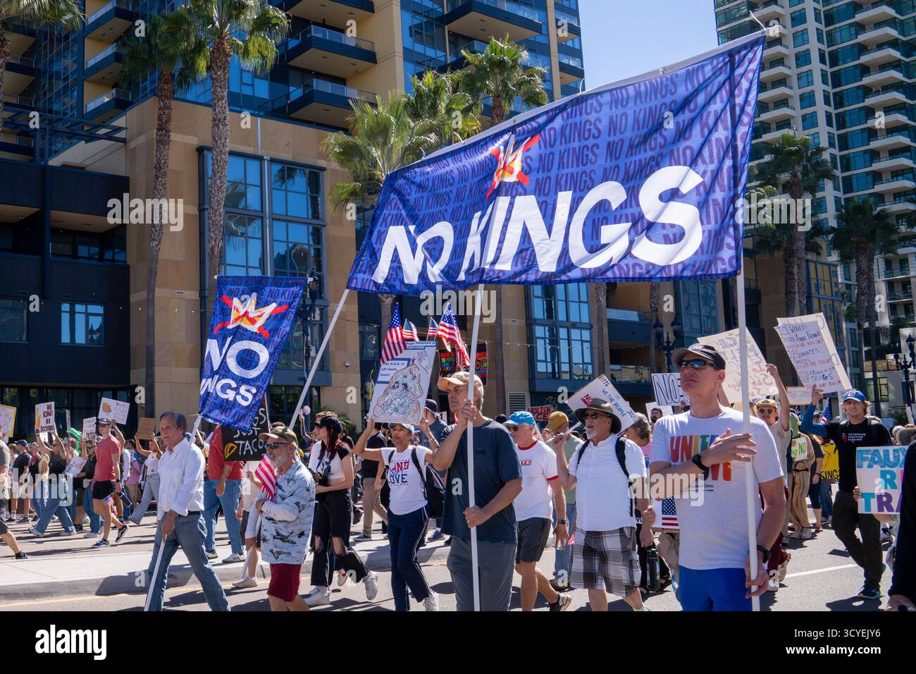 Demonstration Only San Diego, California, USA. 18th Oct, 2025. Participants carry large ...
