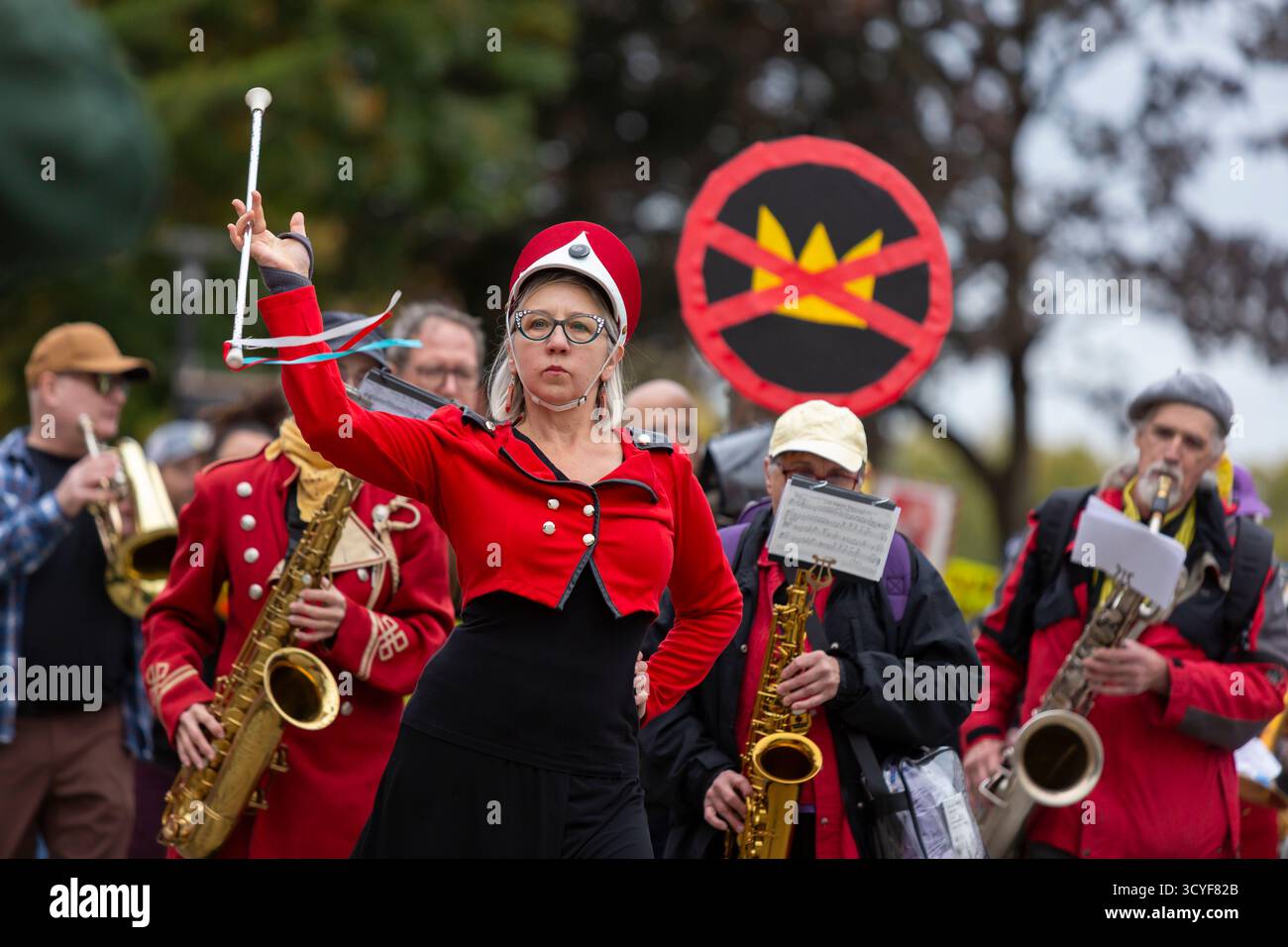 Seattle, Washington, USA. 18th October 2025. Members of the Seattle League of Activist Musicians lead the way at the “No Kings” protest and march. An estimated 90,000 people attended the mass protest as part of a national day of peaceful action organized by the No Kings coalition in response to perceived authoritarian actions and corruption of the Trump administration. Credit: Paul Christian Gordon/Alamy Live News Stock Photo