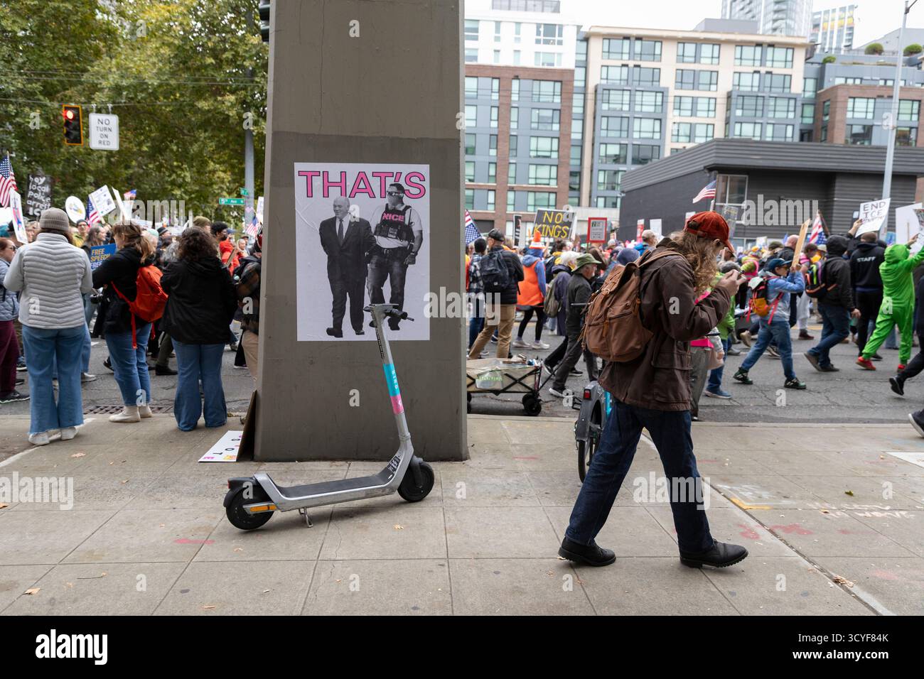 Seattle, Washington, USA. 18th October 2025. Protesters lead the way at the “No Kings” protest and march. An estimated 90,000 people attended the mass protest as part of a national day of peaceful action organized by the No Kings coalition in response to perceived authoritarian actions and corruption of the Trump administration. Credit: Paul Christian Gordon/Alamy Live News Stock Photo
