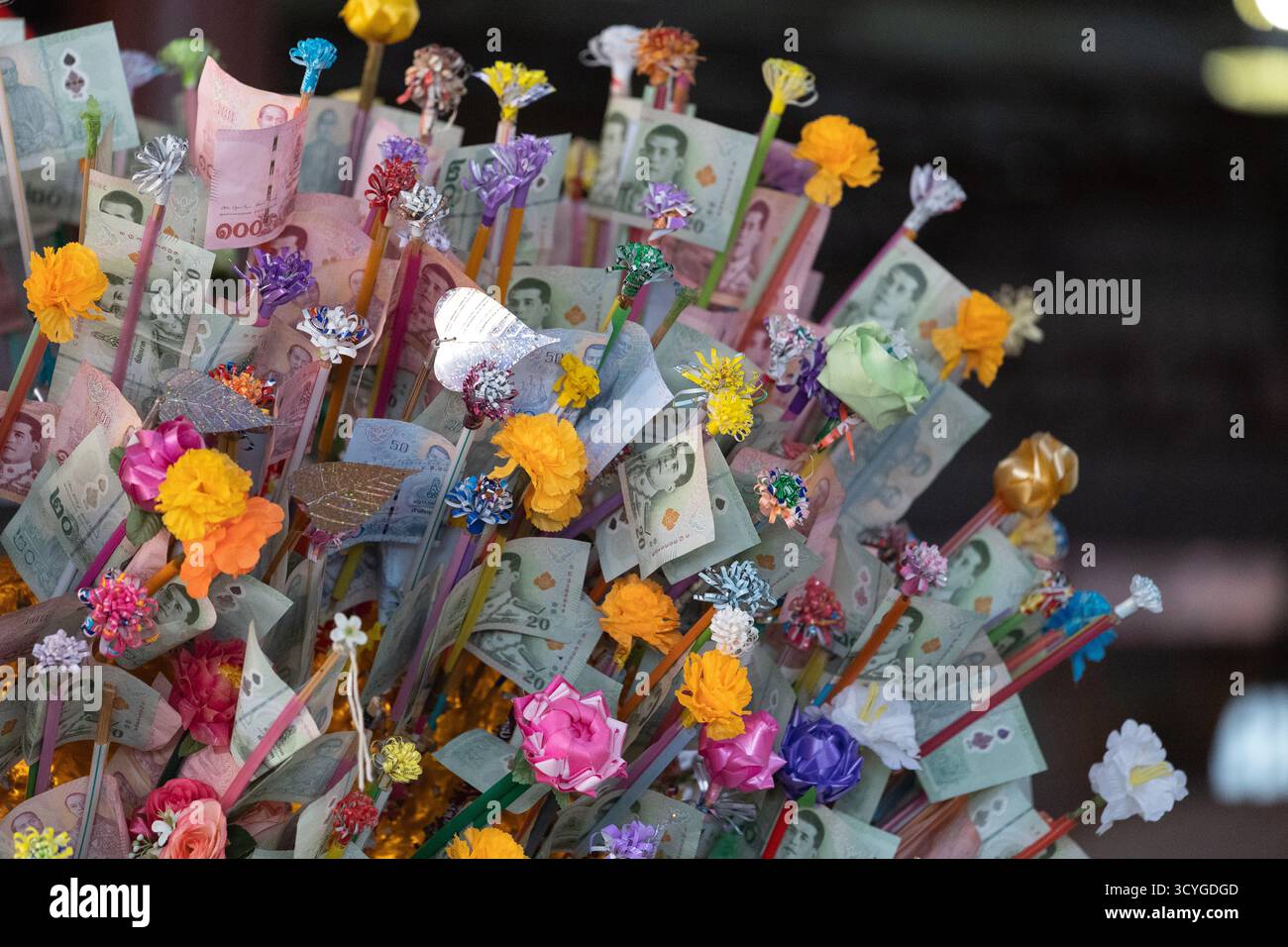 Bangkok, Thailand. 18th Oct, 2025. A money tree decorated with colorful ...