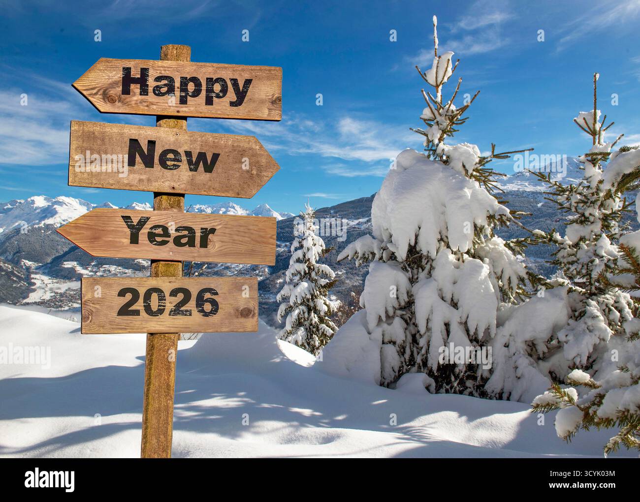 2026 happy new year written on wooden postsign in snowy alpine