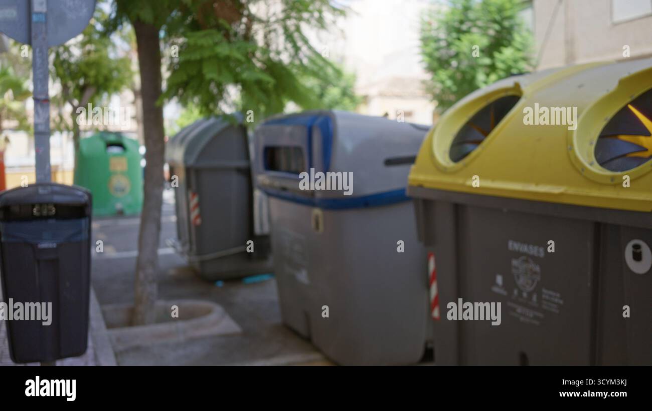 Row defocused recycling bins hi-res stock photography and images - Alamy
