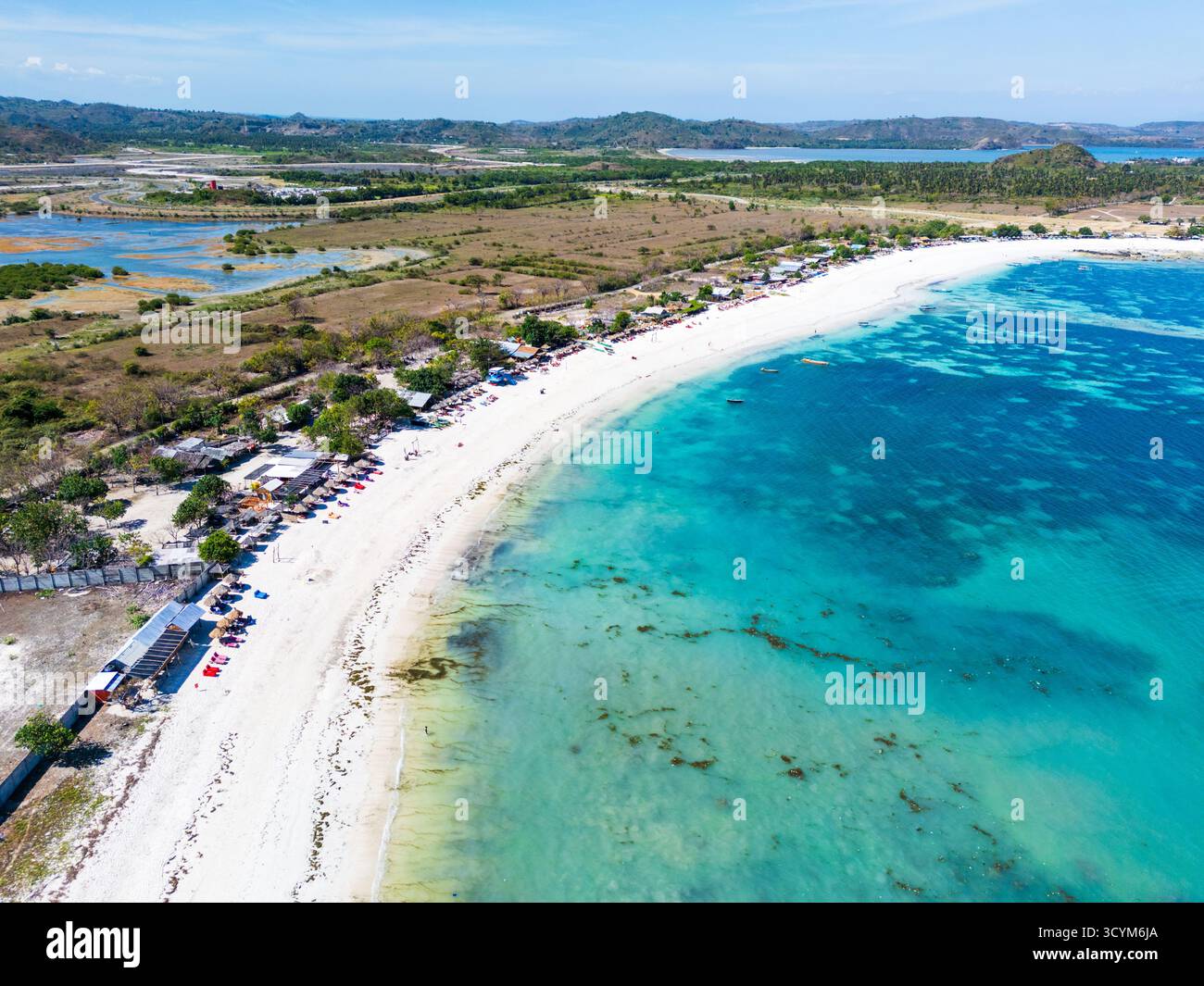Lombok, Indonesia, Beach ocean drone aerial view landscape at Tanjung Ann beach area. Lombok is an island in West Nusa Tenggara province, Indonesia. Stock Photo