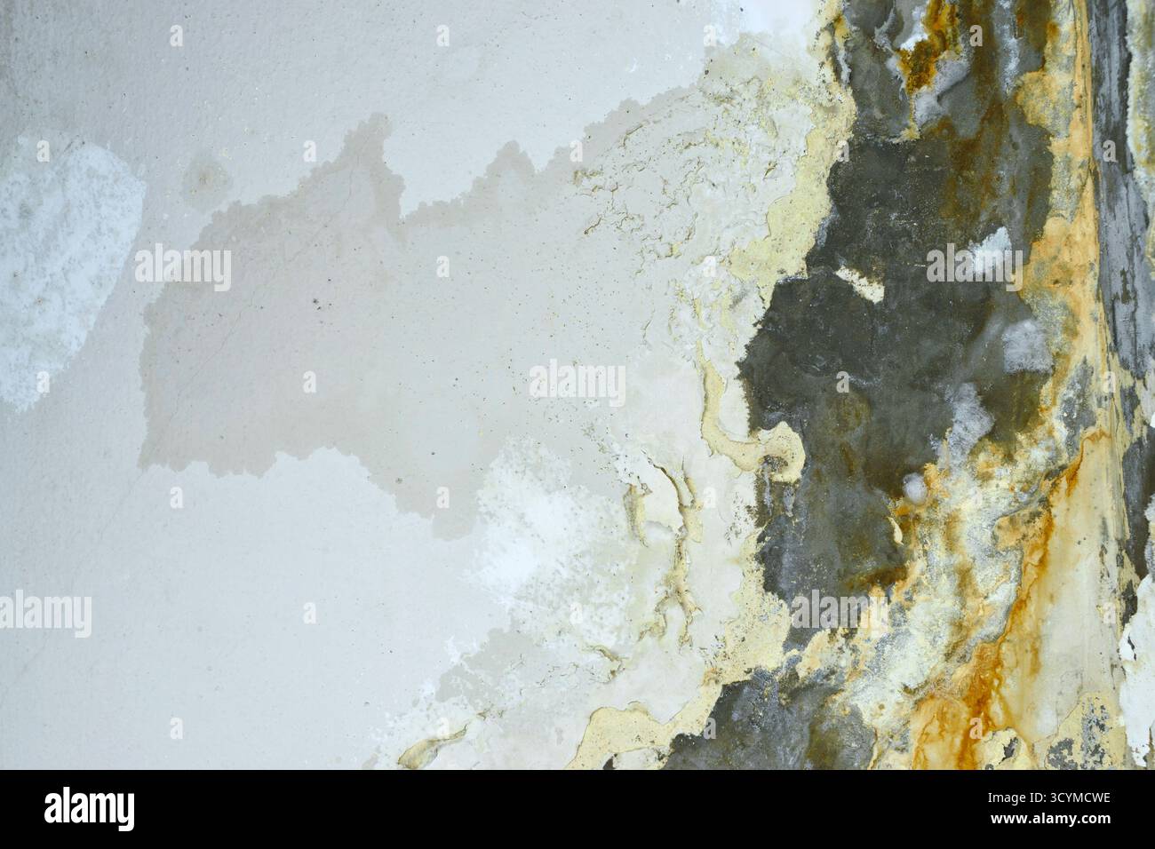 Corroded wall surface with rust and peeling paint. Stock Photo
