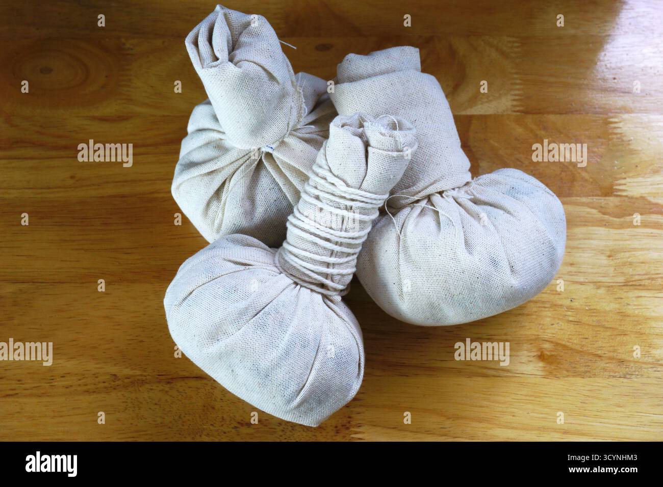 herbal compress ball, thai traditional massage Stock Photo - Alamy