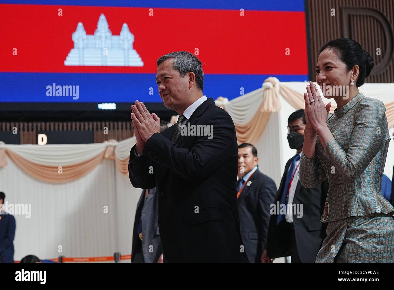 Cambodian Prime Minister Hun Manet, left, greets his officers together ...