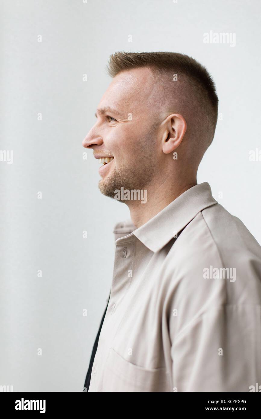 Smiling Man in Profile Stock Photo