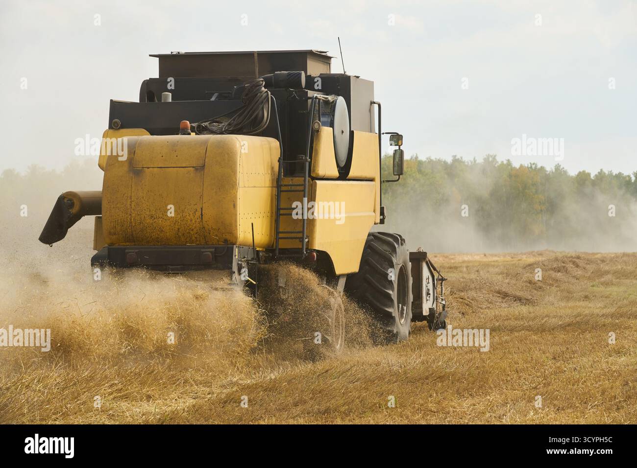 Modern combine harvester processes hi-res stock photography and images ...