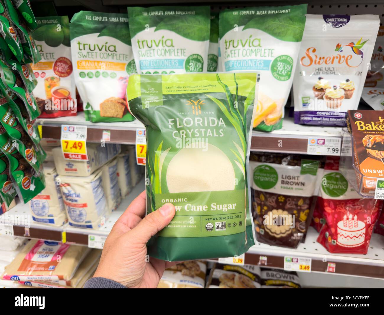 Sugar In Package Sugar cane hand holding bottle hi-res stock photography and images - Alamy