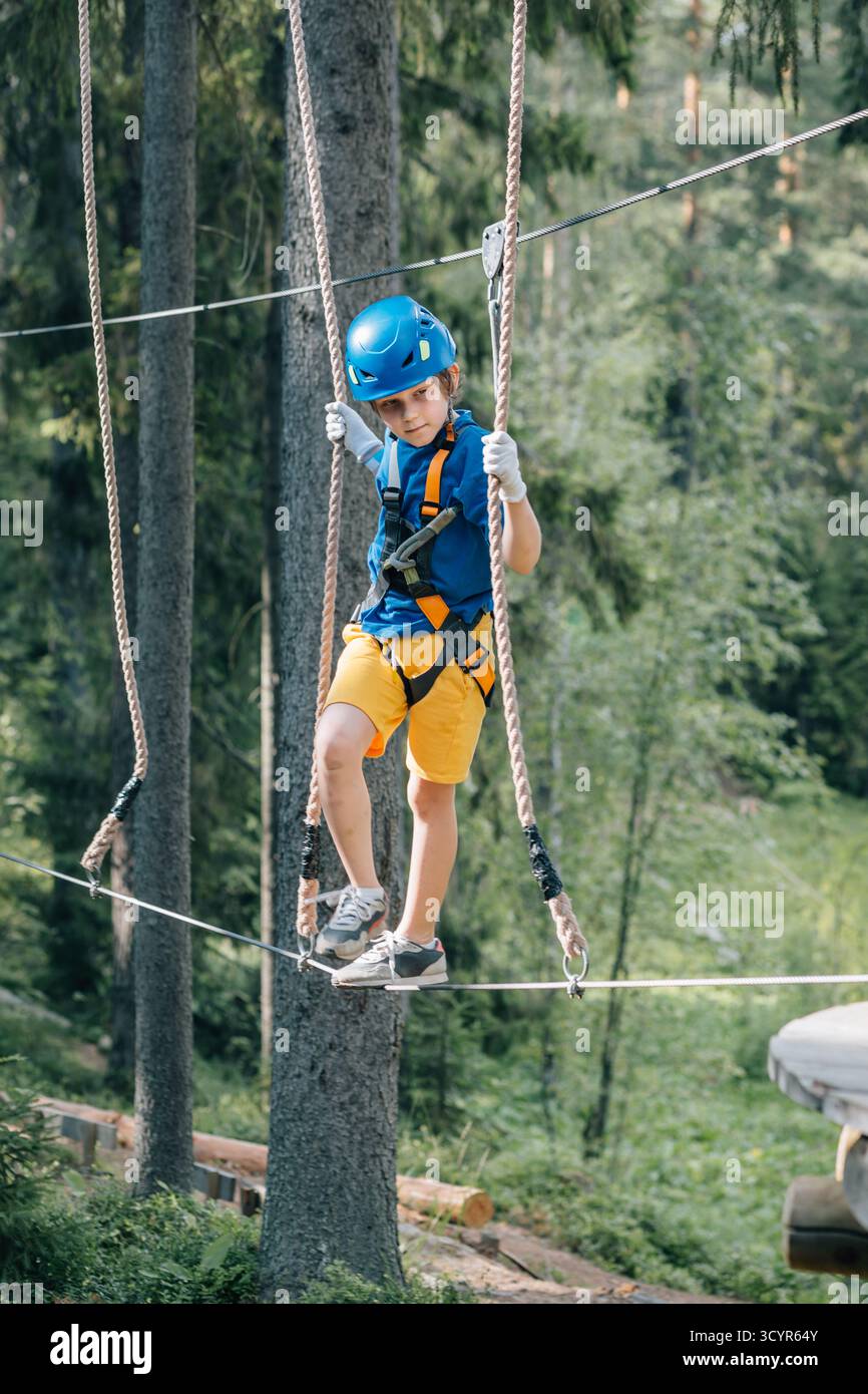 A boy balancing on a beam hi-res stock photography and images - Alamy