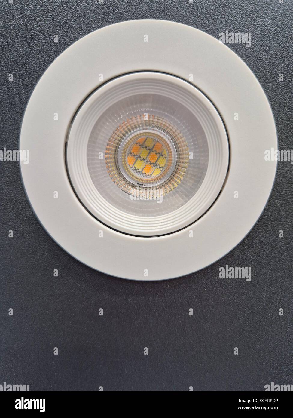 Modern lighting. Recessed LED ceiling lamp with minimalist design - Smartphone Captured Stock Image