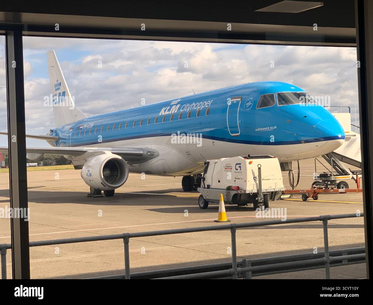 Airport Shetland islands KLM Logan Air British Airways plane planes prop aircraft passengers passenger trip visit   runway clouds view weather truck - Smartphone Captured Stock Image
