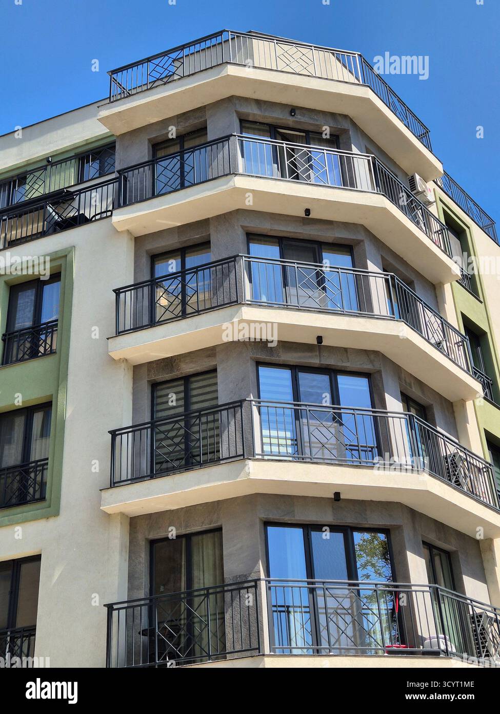 modern apartment building with balconies - Smartphone Captured Stock Image