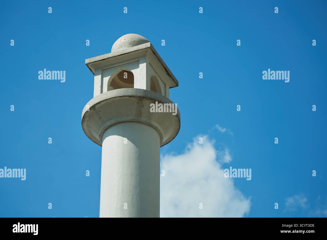 Tsim Sha Tsui, Hong Kong - Oct 11 2025: Looking up to one of the minarets of Kowloon Mosque and Islamic Centre on a sunny day. Stock Photo
