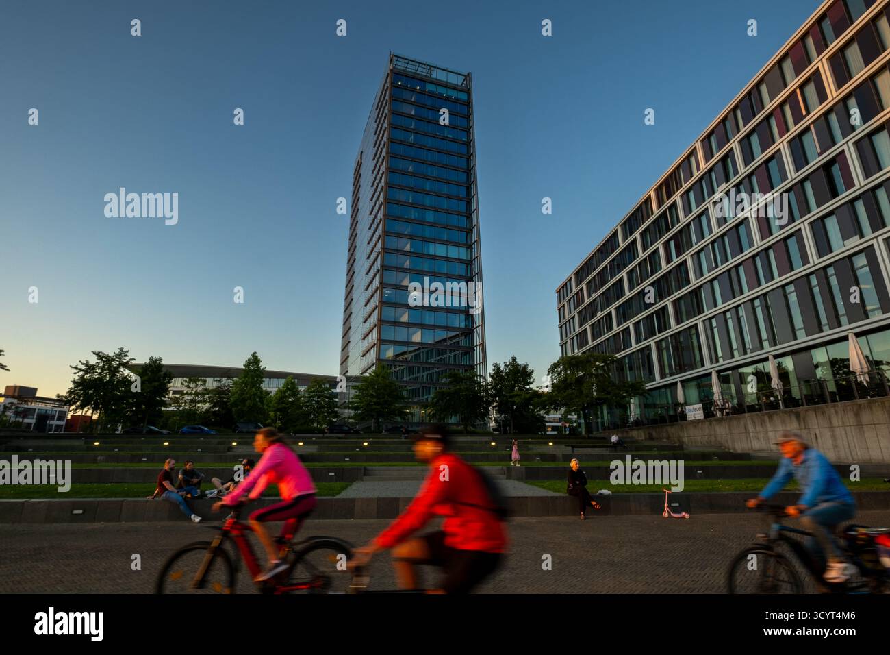 02.09.2025, Germany, Bremen, Bremen - People on the Weser promenade, with the Wesertower in the background and the Steigenberger Hotel Bremen on the r Stock Photo