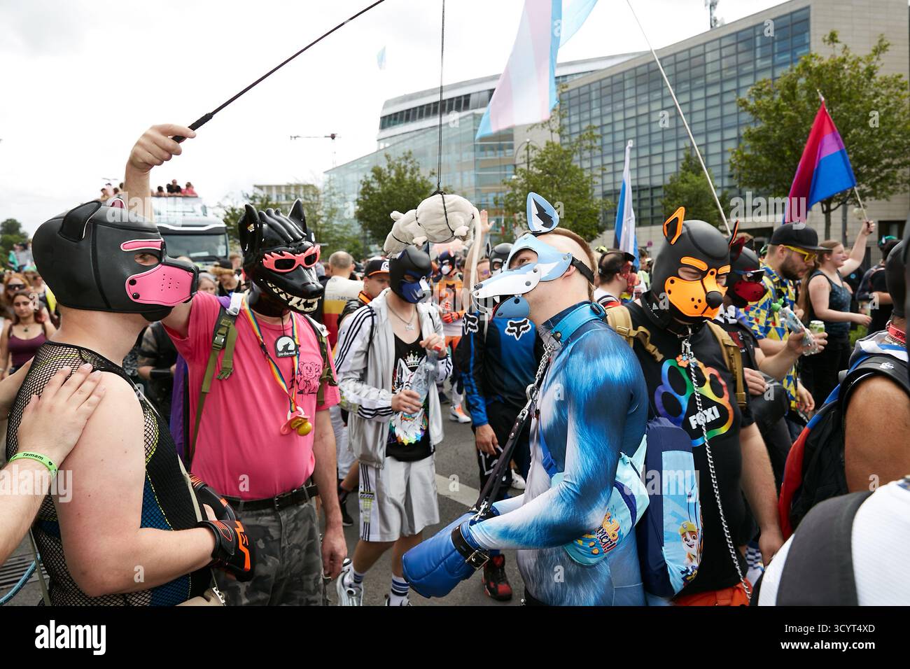 26.07.2025, Germany, Berlin, Berlin - Members of the puppy scene are taking part in the CSD parade in Berlin. Dog masks are an integral part of this f Stock Photo